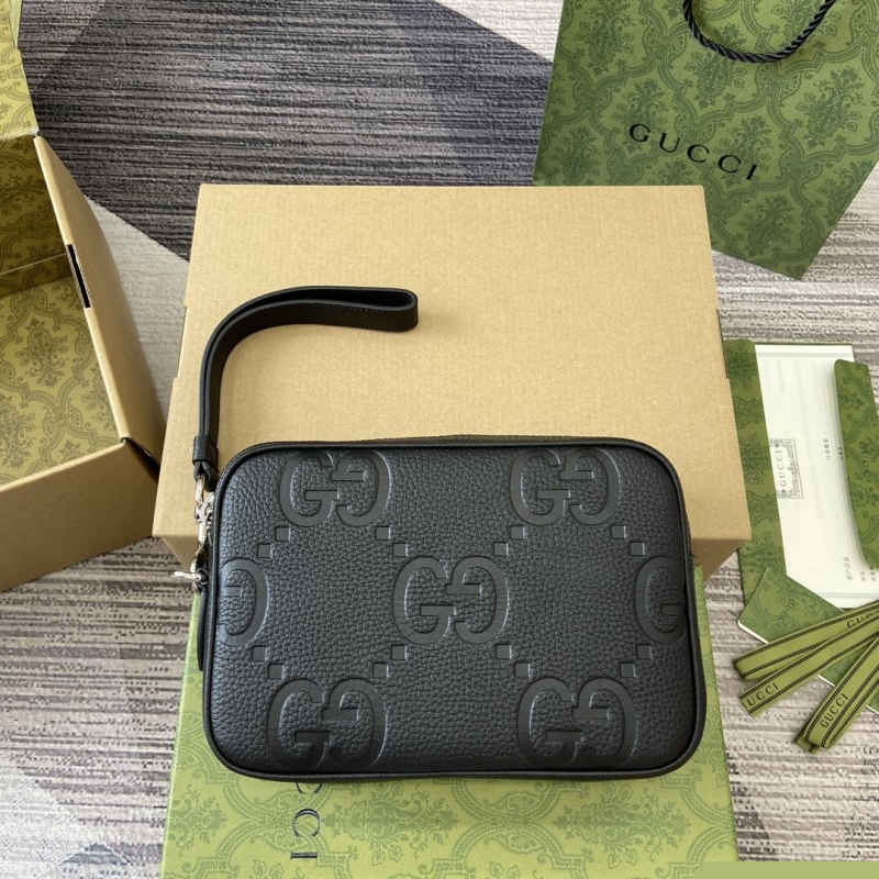G*u*i clutch bags